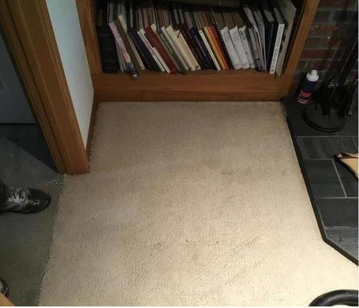 photo of carpet after cleaning up water stain