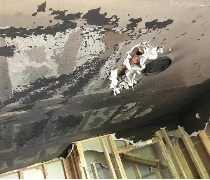 photo of fire damaged ceiling at construction site